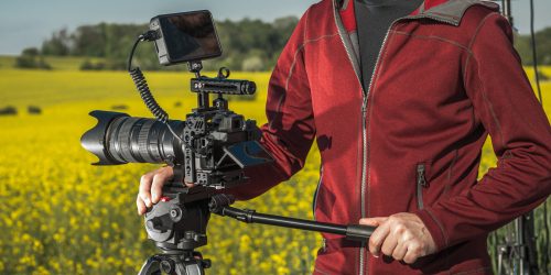 Videographer Operator with Professional Digital Camera